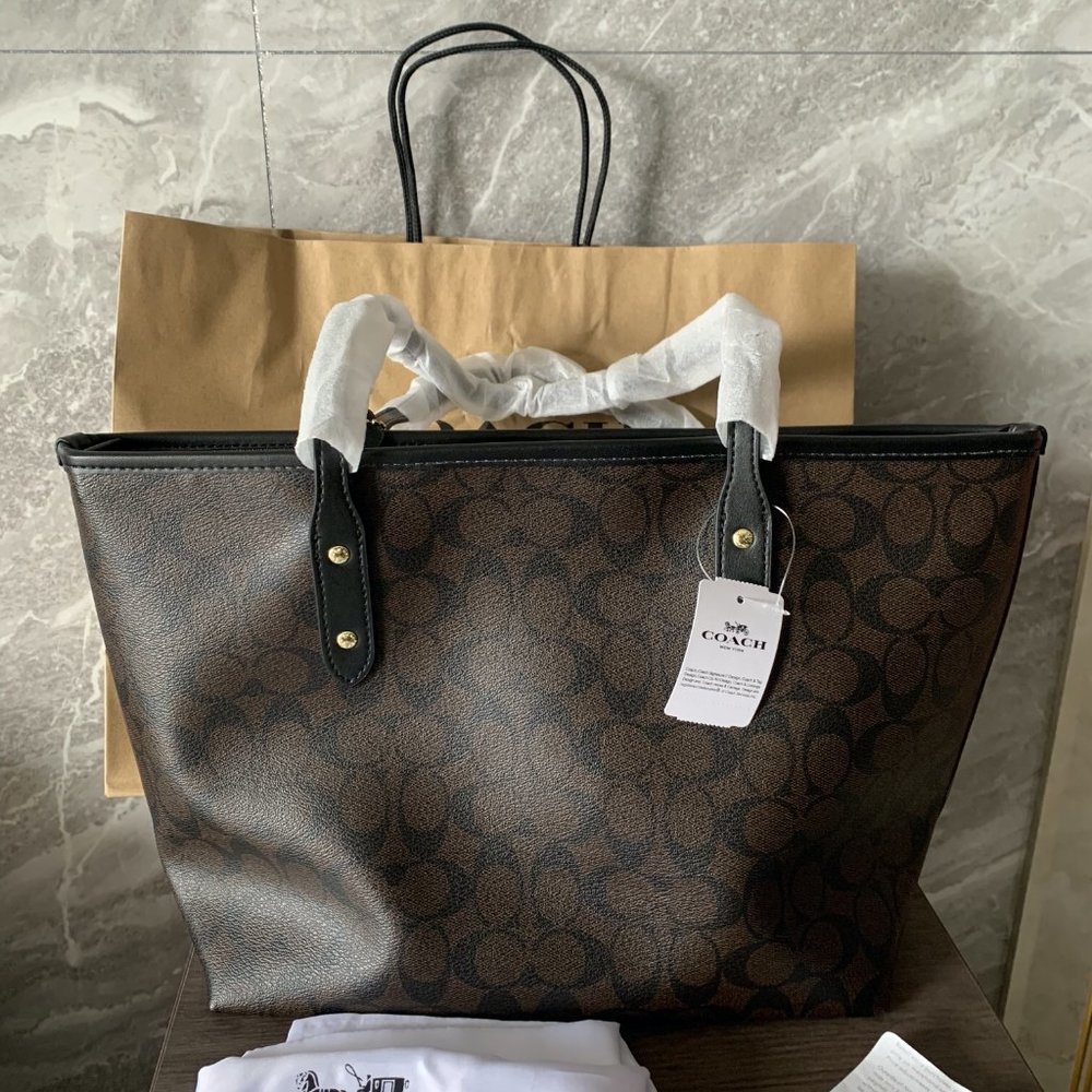 Coach lady handbag. Two color available.